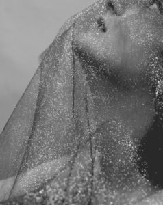 Women with glitter veil In-Cosmetics